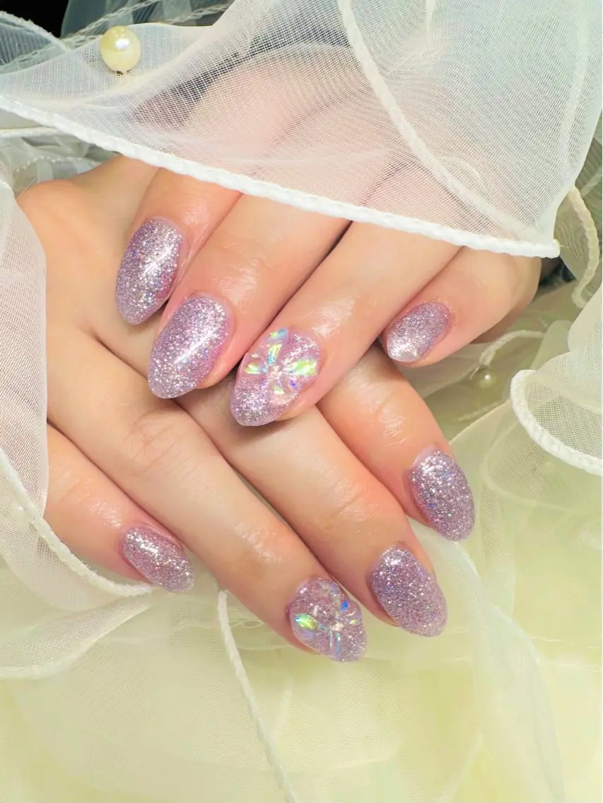 ネイル クリアネイル ラメ(グリッター) パープル リボン 田端 笑理菜のネイルデザイン