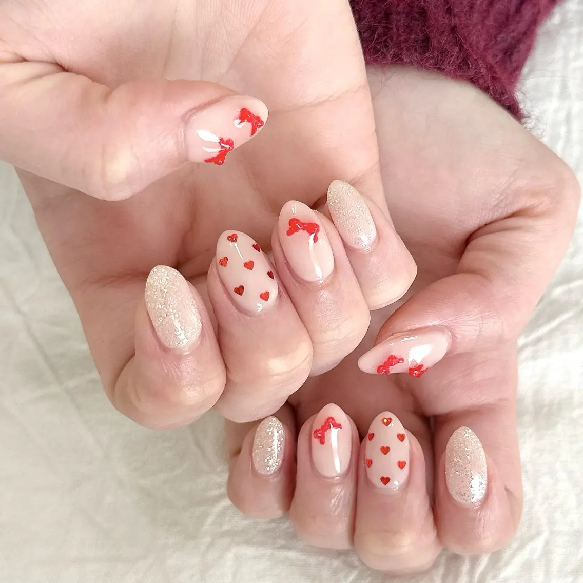 ネイル ガーリー ピンク ピンクベージュ 赤色 リボン ハンドネイル peaberry nailのネイルデザイン