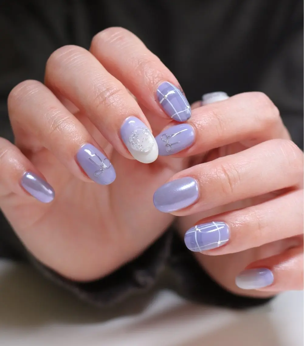 ネイル オーロラネイル ミラーネイル ニュアンスネイル パープル リボン ハンドネイル Baku Nailsのネイルデザイン