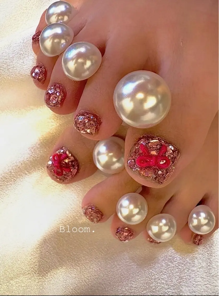 ネイル フットネイル キラキラネイル リボン nail salon Bloom.のネイルデザイン