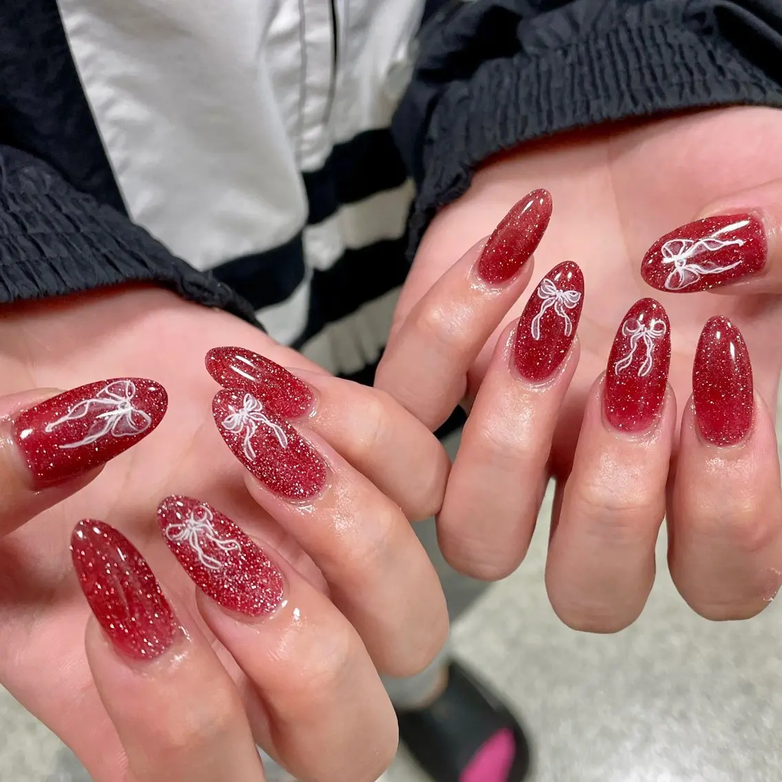 ネイル クリアネイル フラッシュネイル 赤色 リボン ハンドネイル LUNI 久屋大通 ˚✧₊⁎/ yuriのネイルデザイン