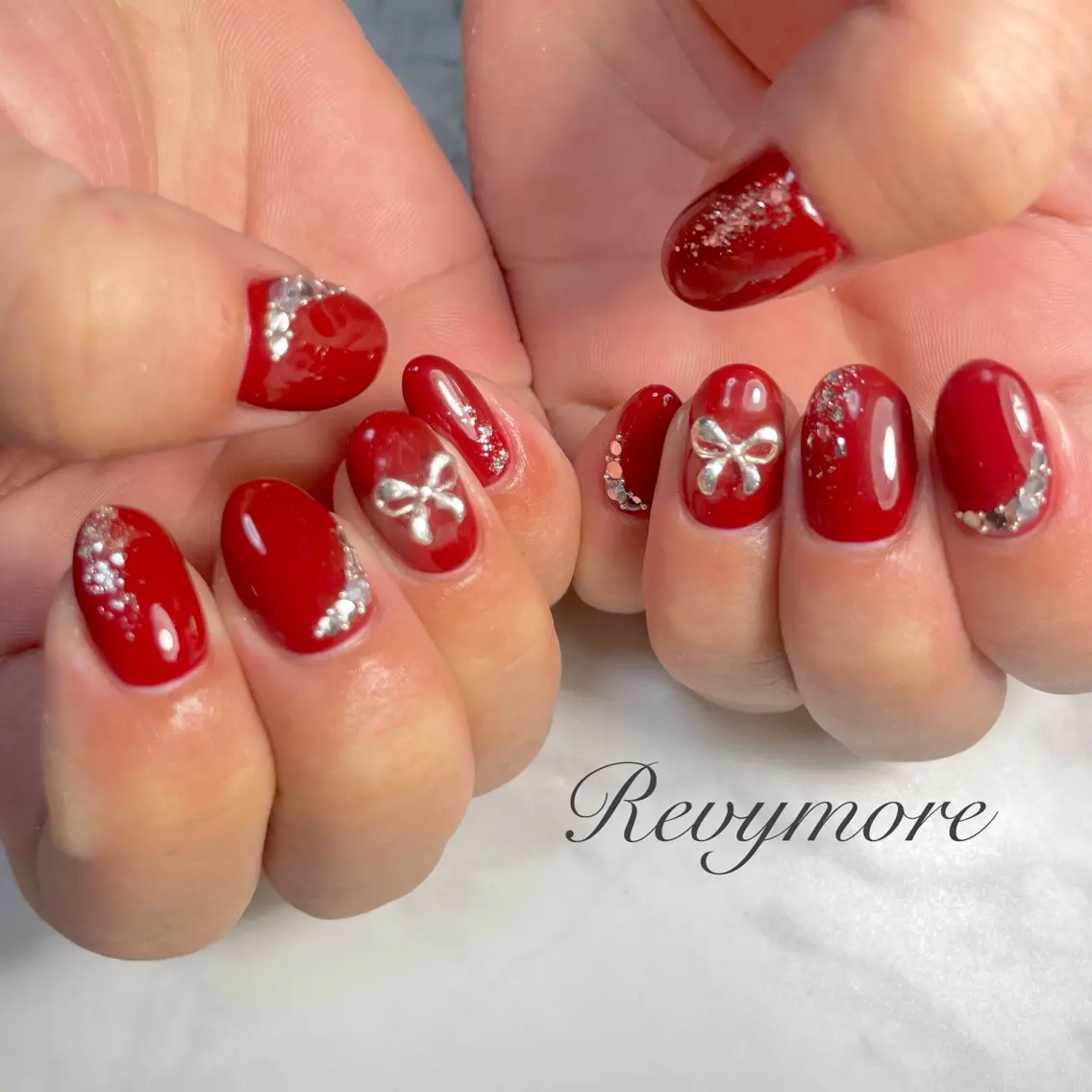 ネイル ボルドー ジェルネイル ニュアンスネイル オフィスネイル リボン nail salon Revymoreのネイルデザイン