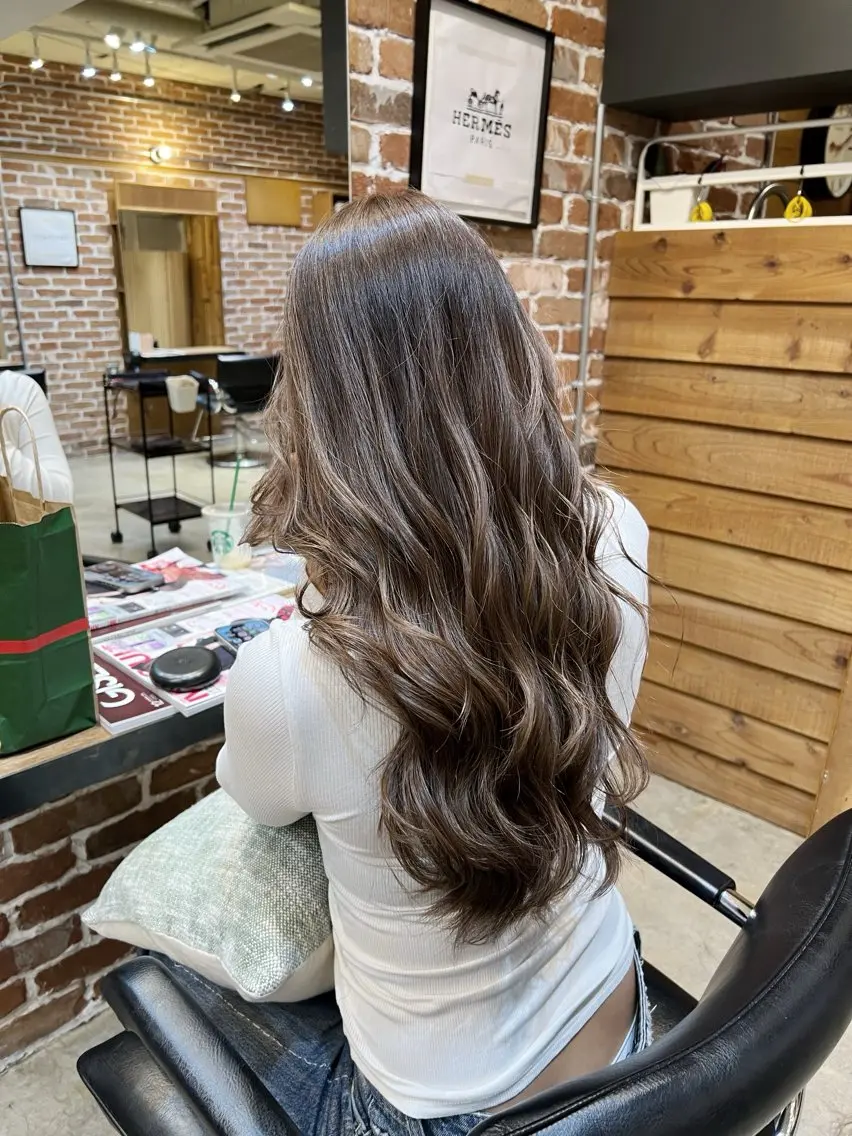 ロング コテ巻き風パーマ サトウタケル 表参道のヘアスタイル