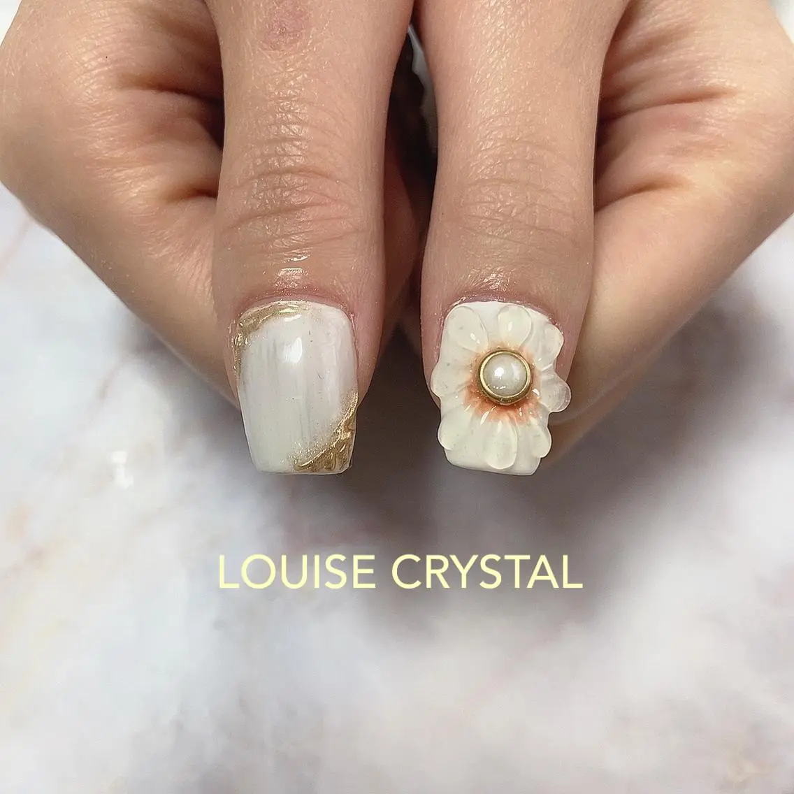 ネイル ハンドネイル LOUISE CRYSTALのネイルデザイン