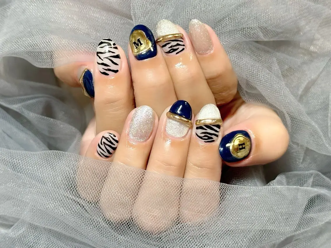 ネイル アニマル柄 マグネットネイル ハンドネイル Nail Salon KURELLYのネイルデザイン