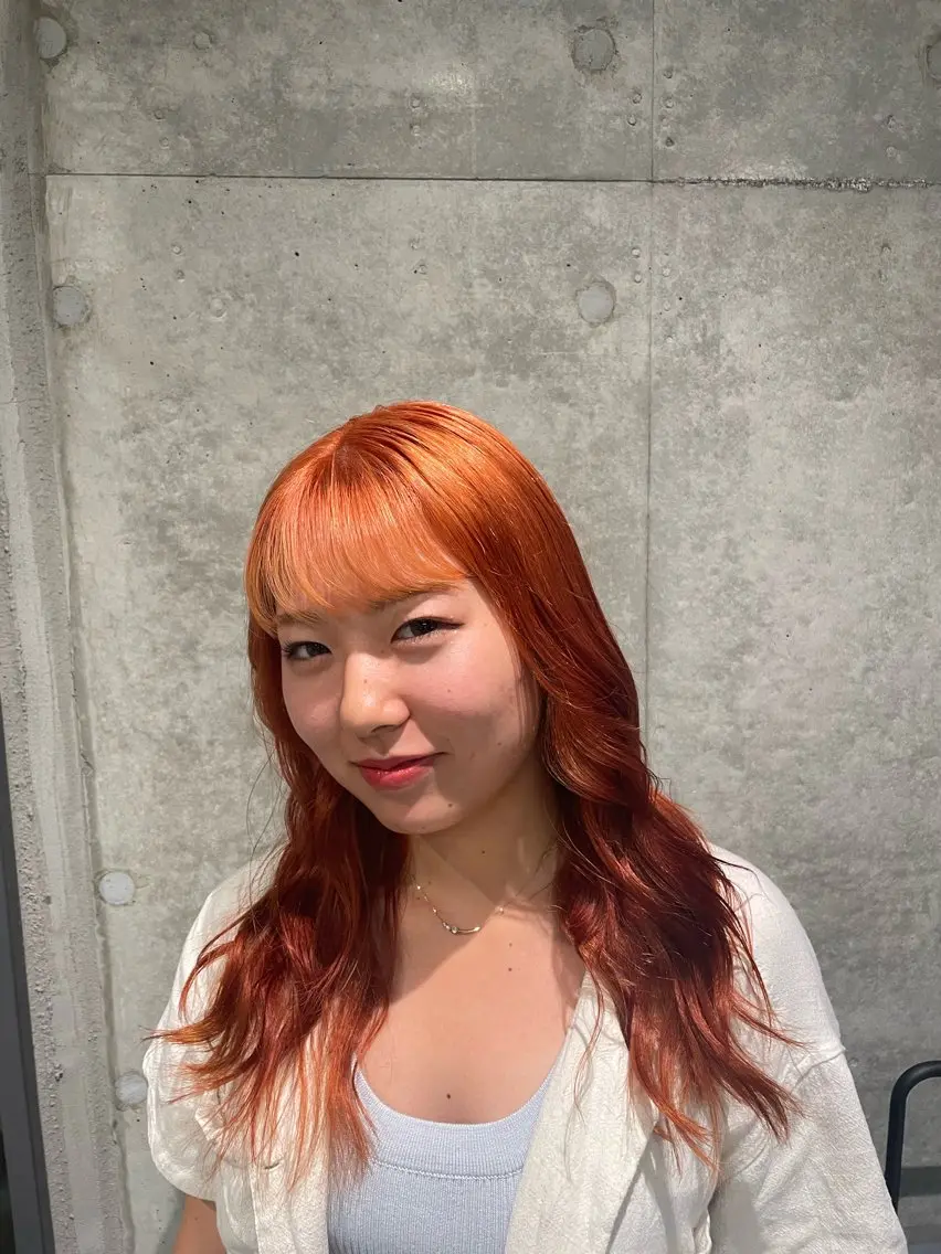 セミロング カラー ブリーチ オレンジ PANOLA下北沢 中川夢菜のヘアスタイル