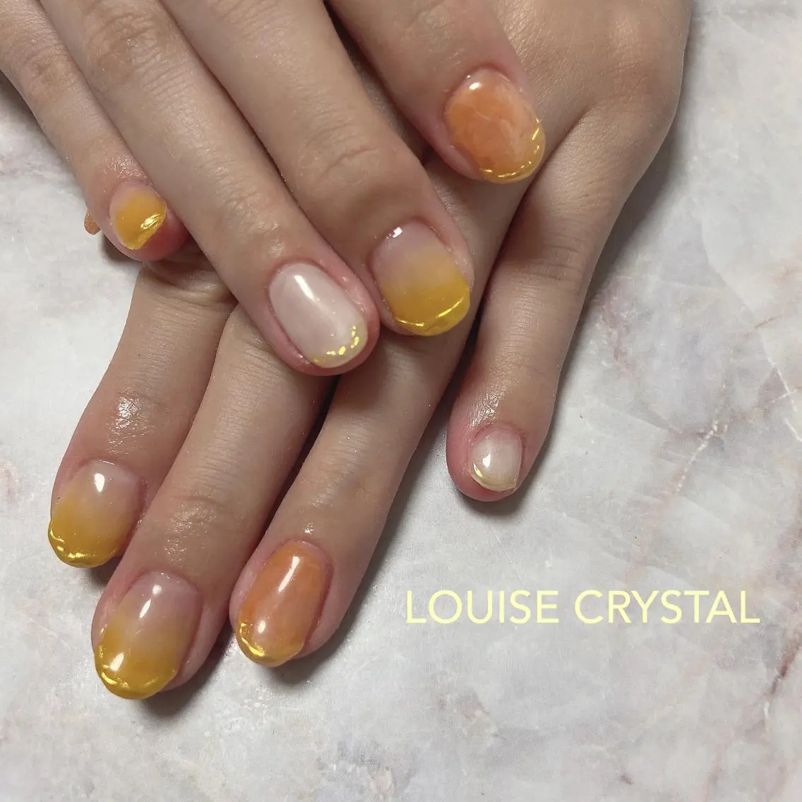 ネイル オレンジ 黄色 ハンドネイル LOUISE CRYSTALのネイルデザイン