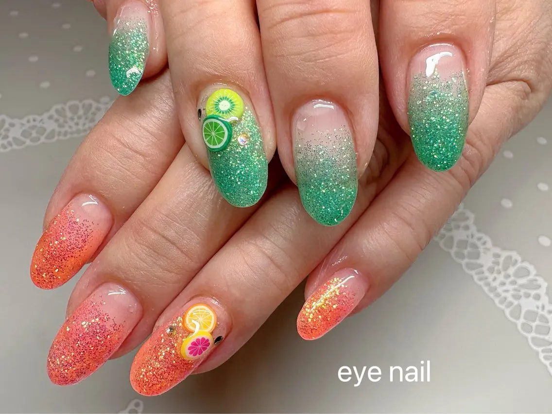 ネイル グラデーション ラメ(グリッター) ラメグラデーション オレンジ ピンク ハンドネイル Eye nailのネイルデザイン