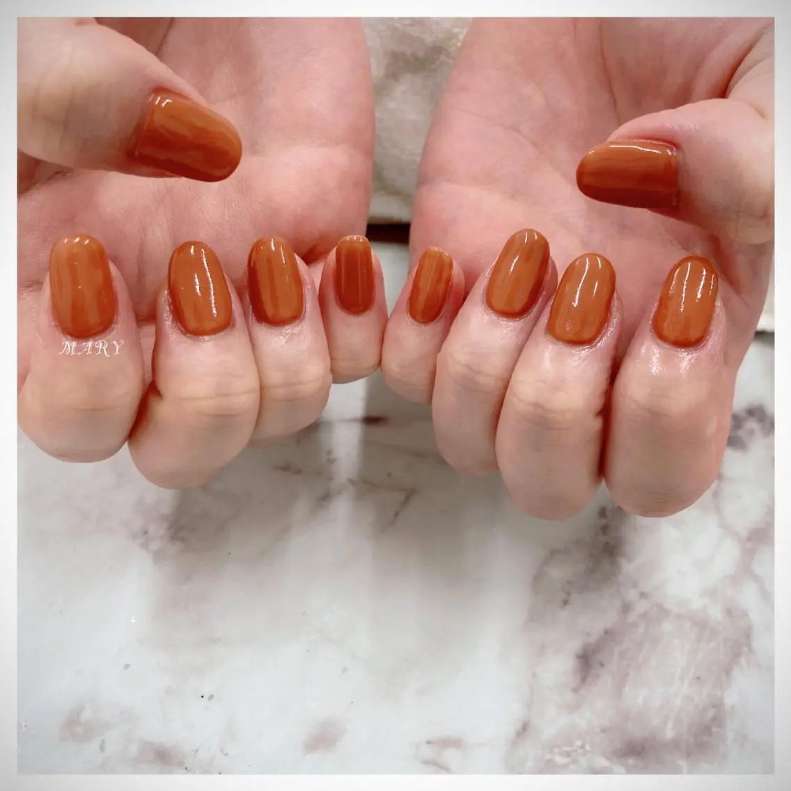 ネイル ニュアンスネイル オフィスネイル ワンカラーネイル オレンジ シンプルネイル ハンドネイル Mary nail .narumiのネイルデザイン