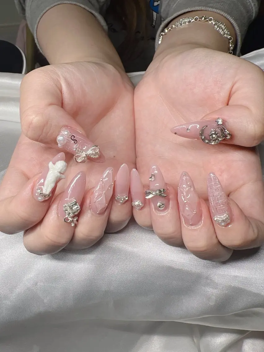 ネイル 長さ出し グラデーション 卒業式 キラキラネイル マグネットネイル Lee Nailsのネイルデザイン