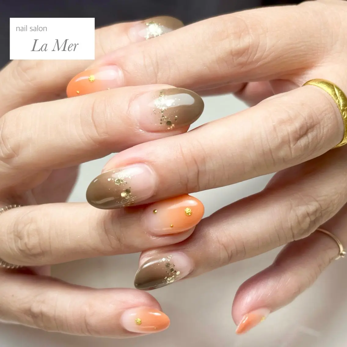 ネイル ブラウン ゴールド グラデーション ラメ(グリッター) オレンジ ハンドネイル nailsalon La Merのネイルデザイン