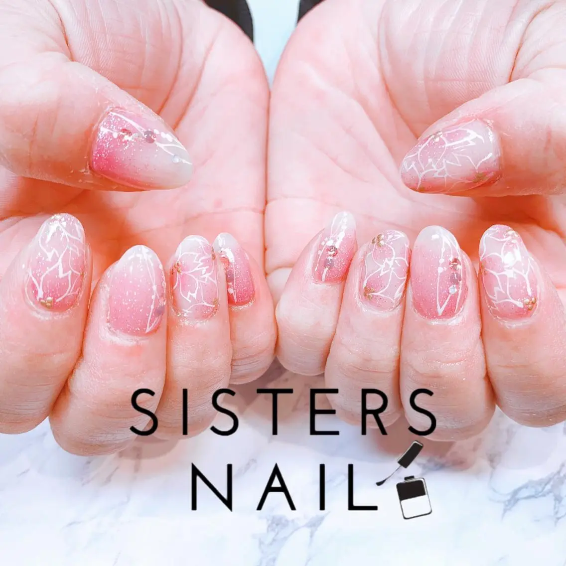 ネイル アートネイル 桜ネイル フラワーネイル 卒業式 春ネイル sisters nail.fのネイルデザイン