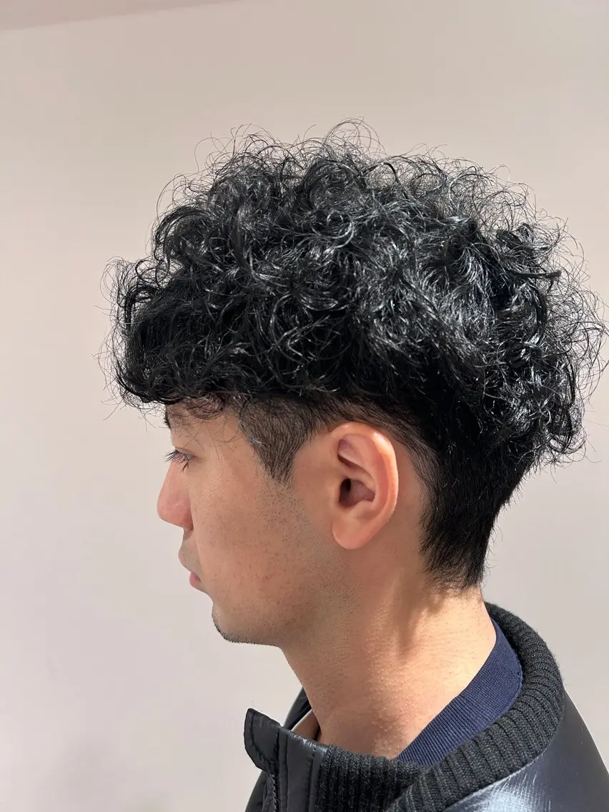 くるくるカールのプードルパーマの写真