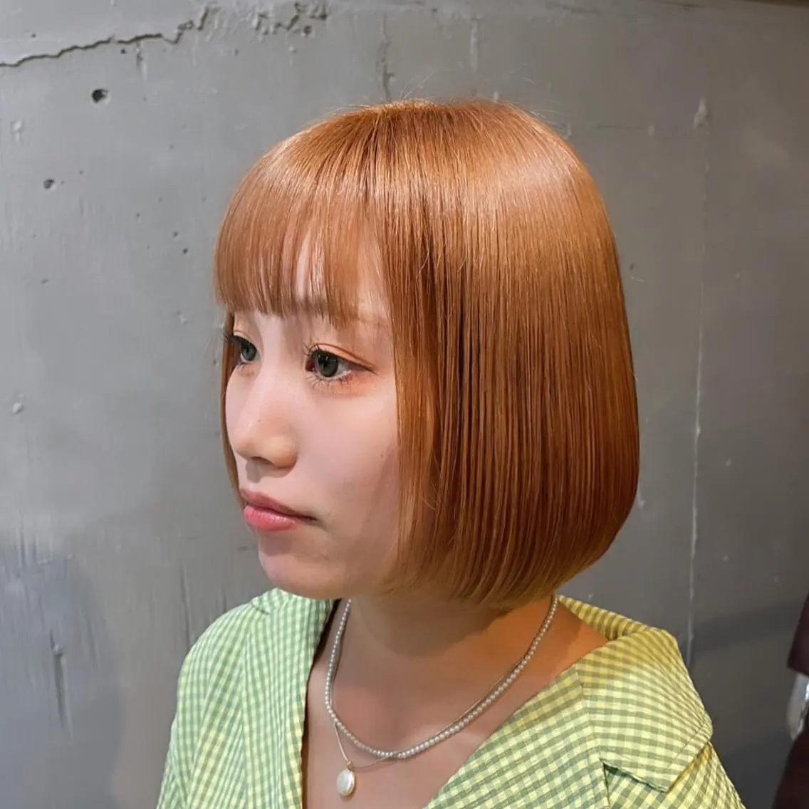 ミディアム カラー ハイトーンカラー オレンジ ピンクカラー ボブ ヘアカラー トリートメント ヘッドスパ ヘアセット カジュアルを女っぽく 𝗮𝘆𝗮𝗰𝗼のヘアスタイル