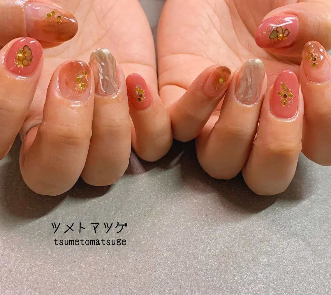 ミディアム ネイル アートネイル ツメトマツゲ .のネイルデザイン