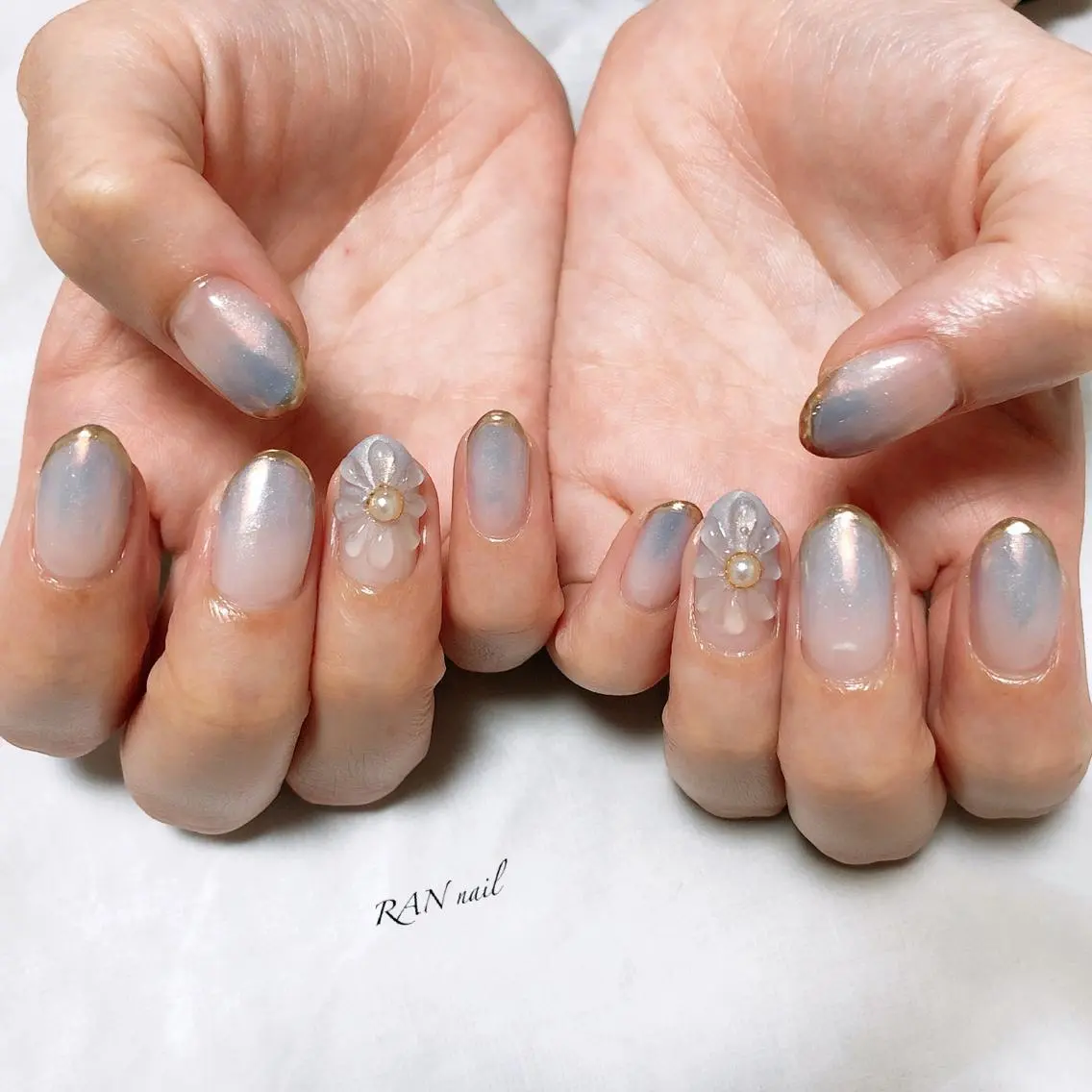 ネイル オーロラネイル ブルー フラワーネイル フットネイル キラキラネイル ハンドネイル フットネイル RAN nailのネイルデザイン