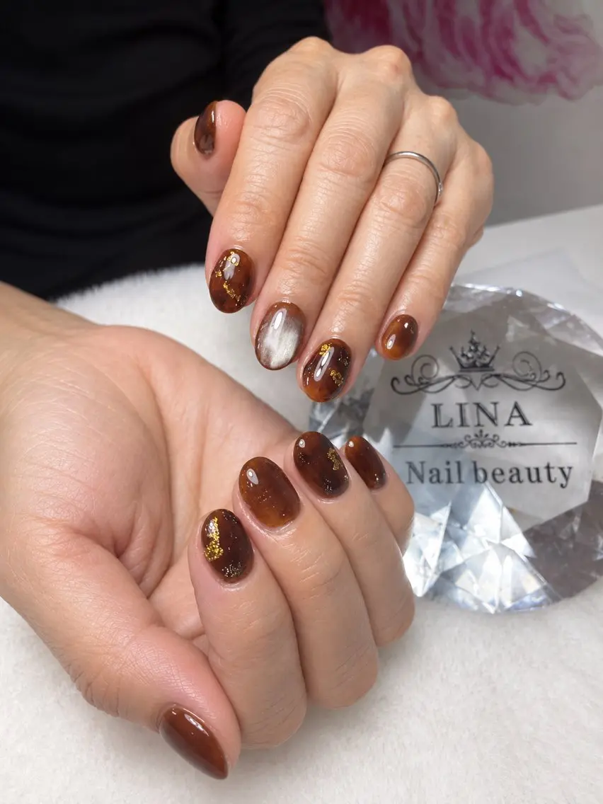 ネイル べっ甲ネイル ブラウン ニュアンスネイル ワンホンネイル Lina  nail beautyのネイルデザイン