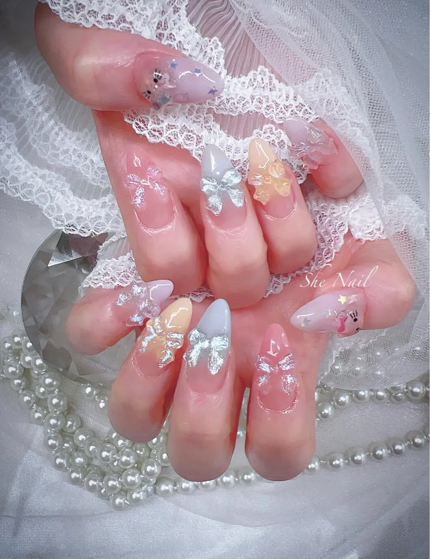 ネイル グラデーション リボン 夏ネイル ハンドネイル ISA_ BELLAのネイルデザイン