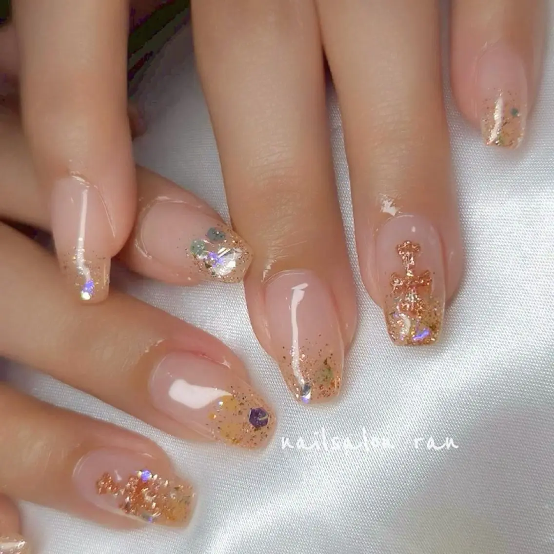 ネイル グラデーション ラメ(グリッター) ラメグラデーション オレンジ ピンク ハンドネイル ハンドケア nailsalon ranのネイルデザイン
