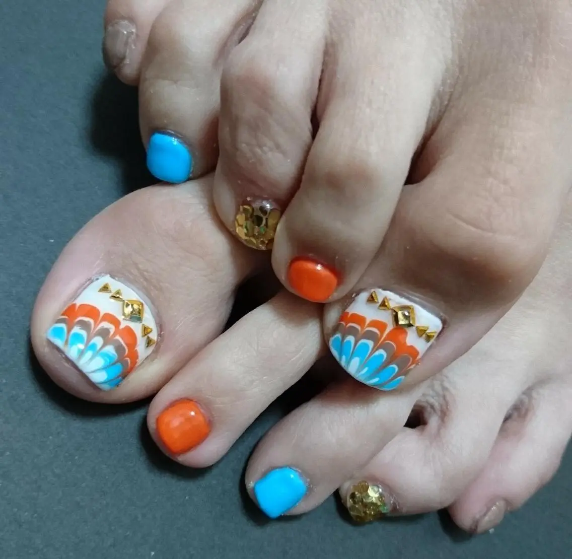 ネイル オレンジ ピーコックネイル フットネイル Lilith Nailのネイルデザイン