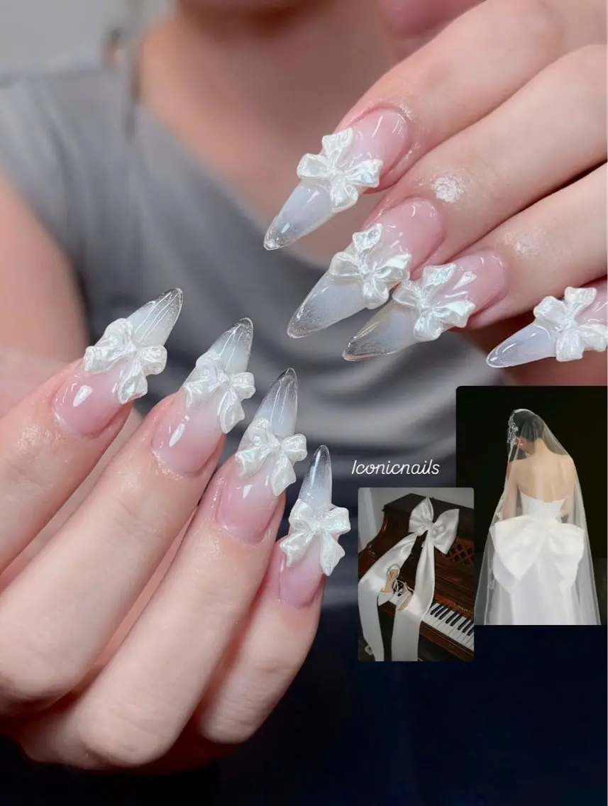 ネイル クリアネイル ガーリー ロングネイル 持ち込み リボン Iconic Nailのネイルデザイン
