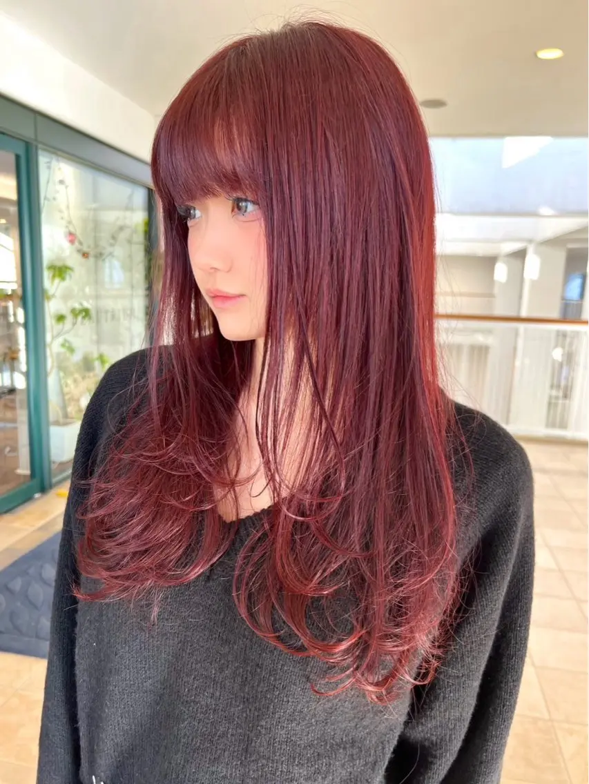 小顔見えレイヤーカットの写真