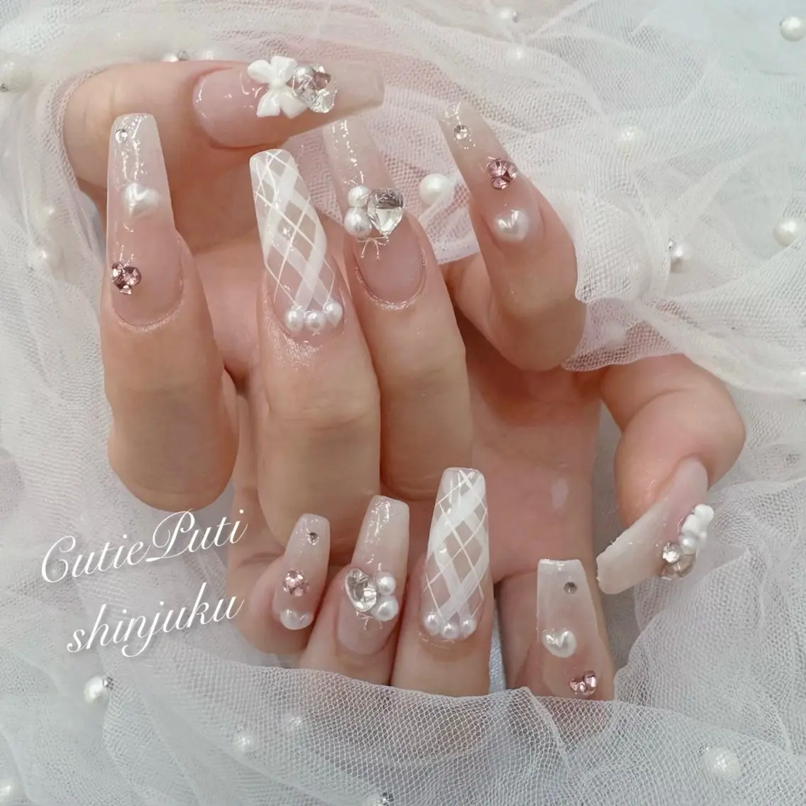 ネイル 長さ出し 韓国ネイル ロングネイル ワンホンネイル NailSalon CutiePutiのネイルデザイン