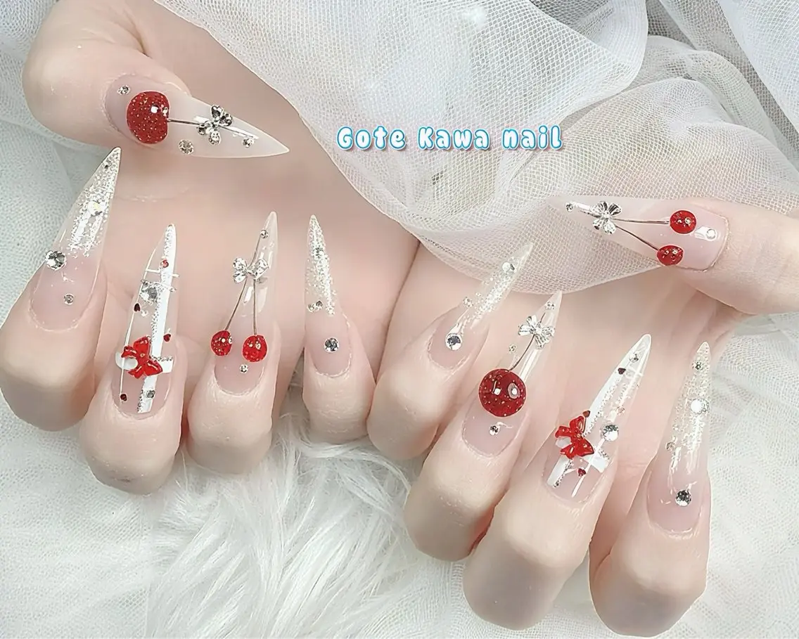 ネイル キラキラネイル リボン 春ネイル ハンドネイル ハンドケア Gote Kawa nail salonのネイルデザイン