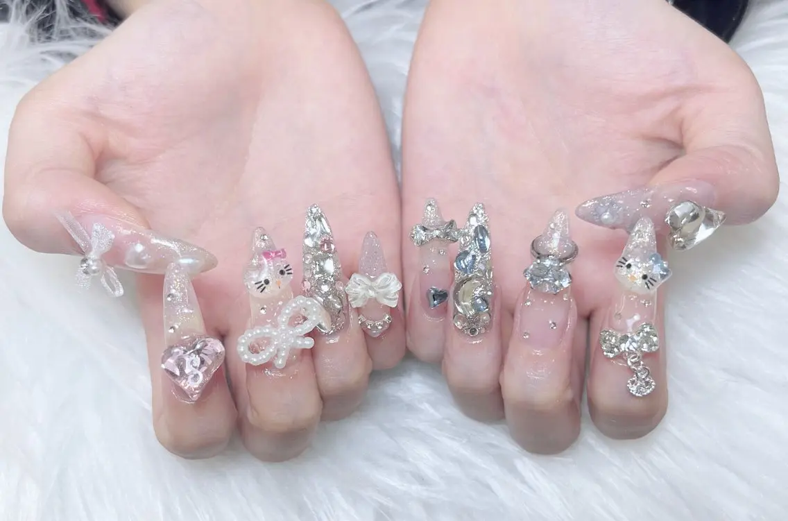 ネイル 成人式 ロングネイル マグネットネイル 大理石ネイル(マーブル) リボン ハンドネイル Amee Nail Salonのネイルデザイン