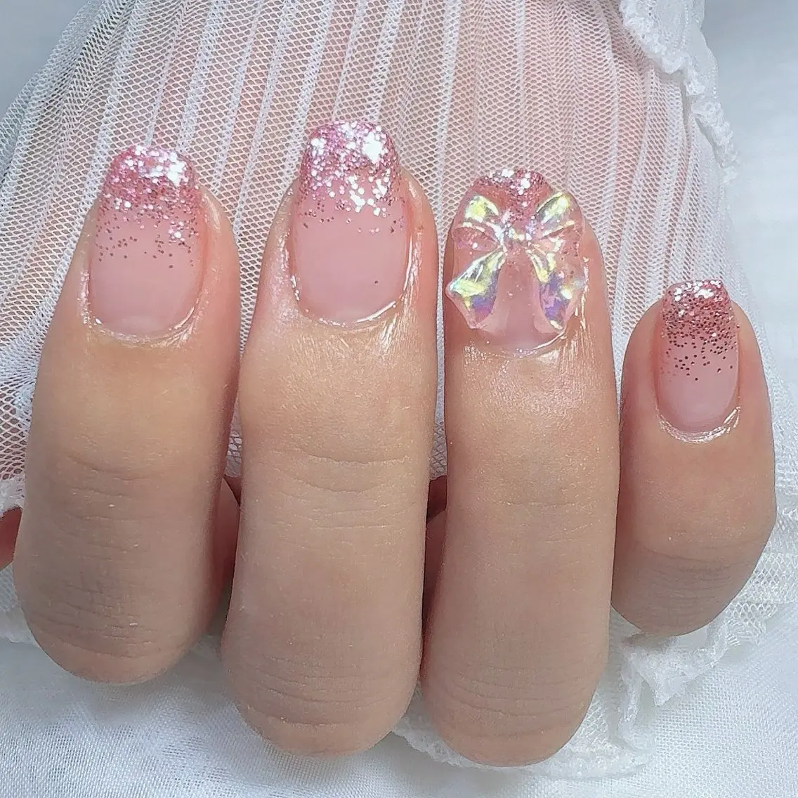 ネイル グラデーション ラメ(グリッター) ラメグラデーション リボン nailsalon urümのネイルデザイン