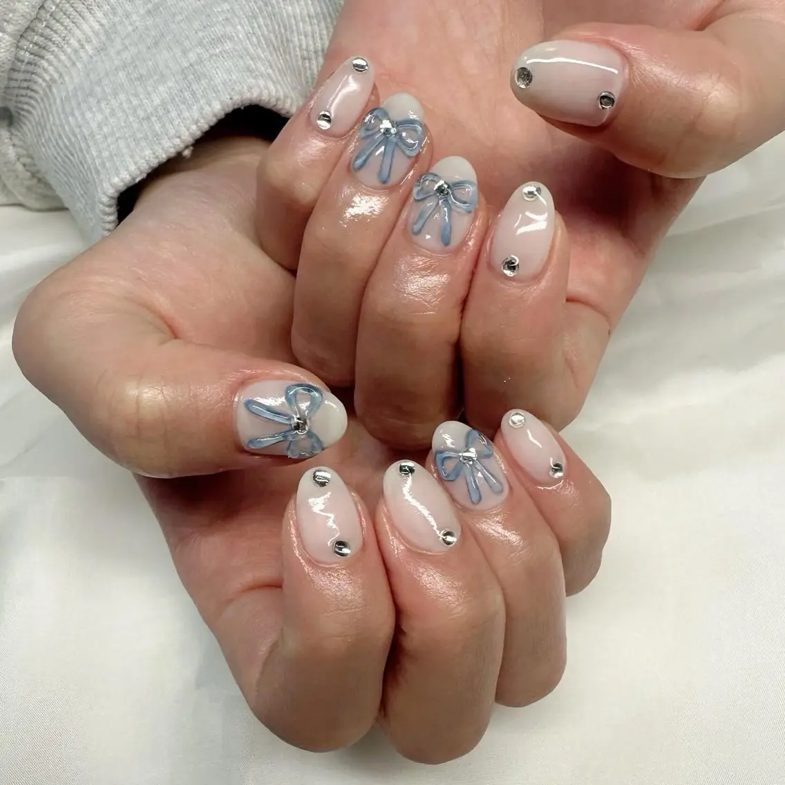ネイル 氷ネイル・うるうるネイル 韓国ネイル ニュアンスネイル リボン 🪞KAPE NAIL 🪞のネイルデザイン