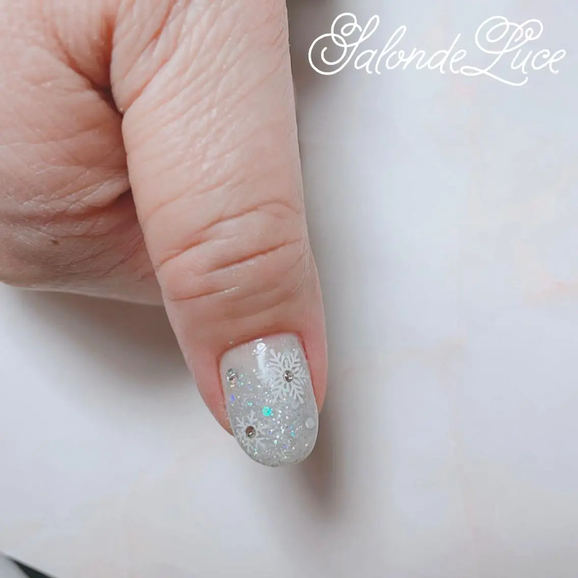 ネイル キラキラネイル 冬ネイル クリスマス Salon de Luceのネイルデザイン