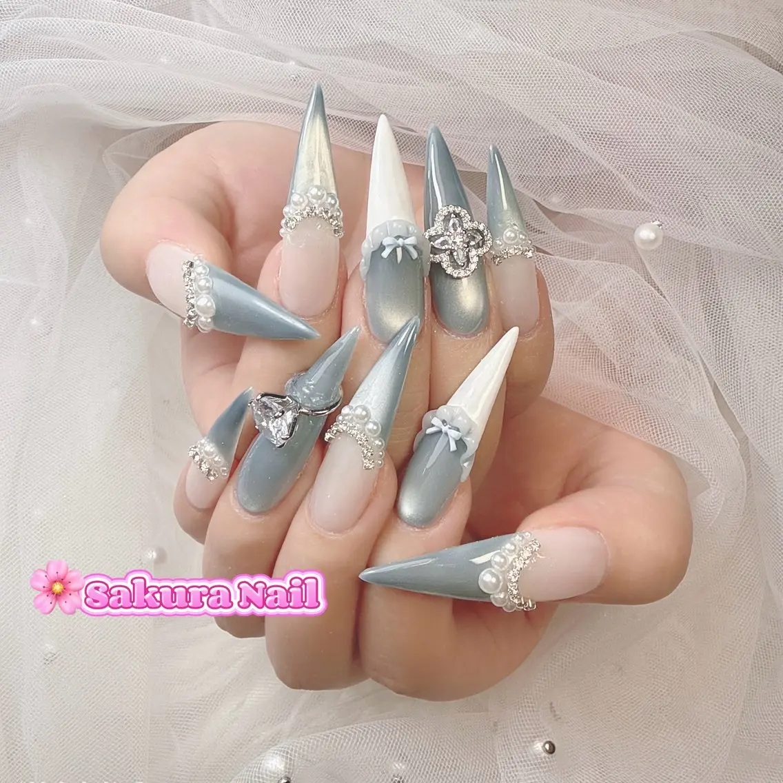 ネイル アートネイル オーロラネイル ボルドー チークネイル フレンチネイル ハンドネイル Sakura Nail Salonのネイルデザイン