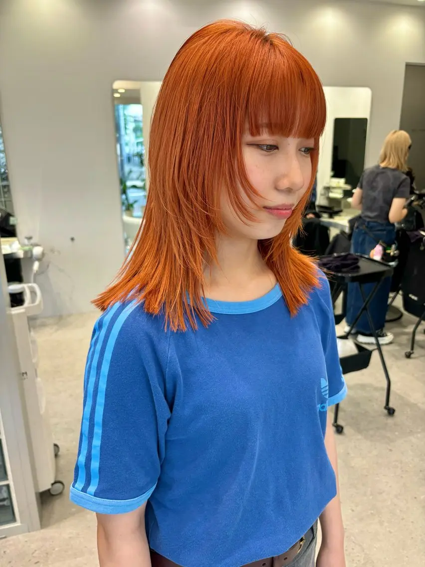 ミディアム カラー オレンジ iLi 《イリ》のヘアスタイル