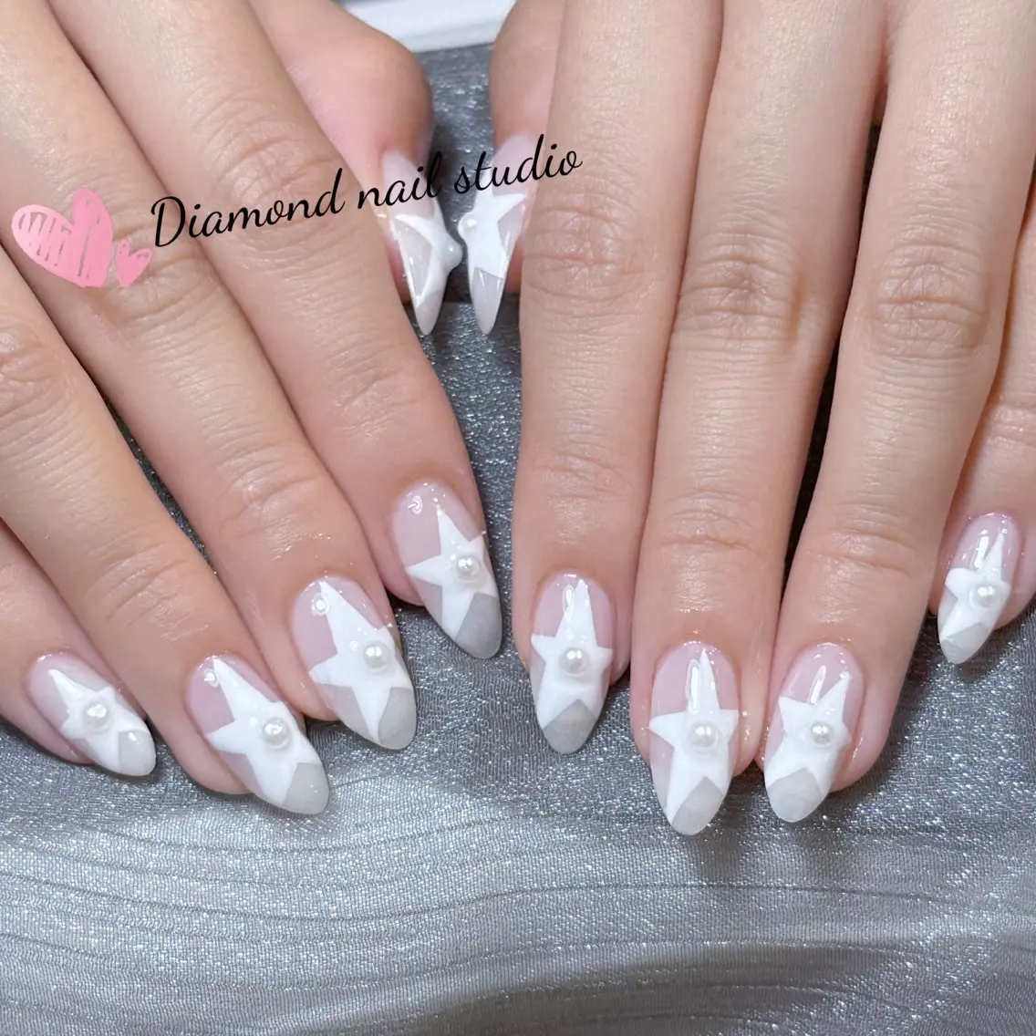 ネイル アートネイル オーロラネイル フラッシュネイル ガーリー キラキラネイル ハンドネイル Una NAILMANAMIのネイルデザイン