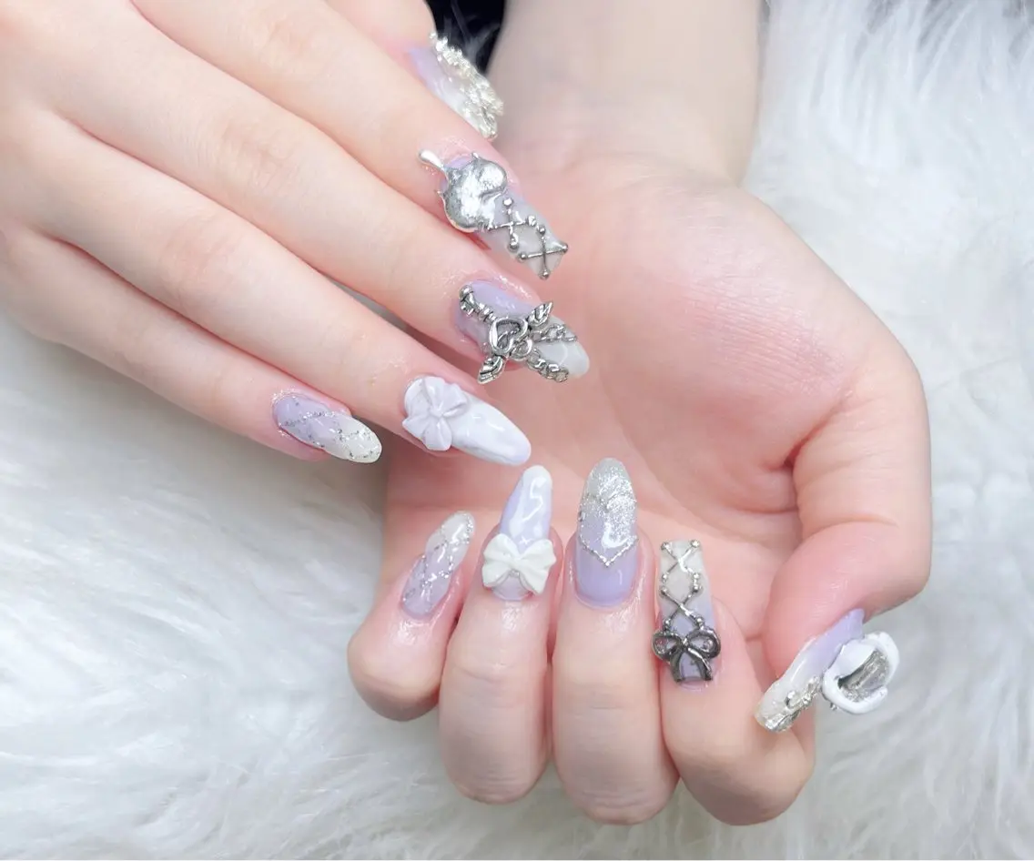 ネイル 成人式 ロングネイル マグネットネイル 大理石ネイル(マーブル) リボン ハンドネイル Amee Nail Salonのネイルデザイン