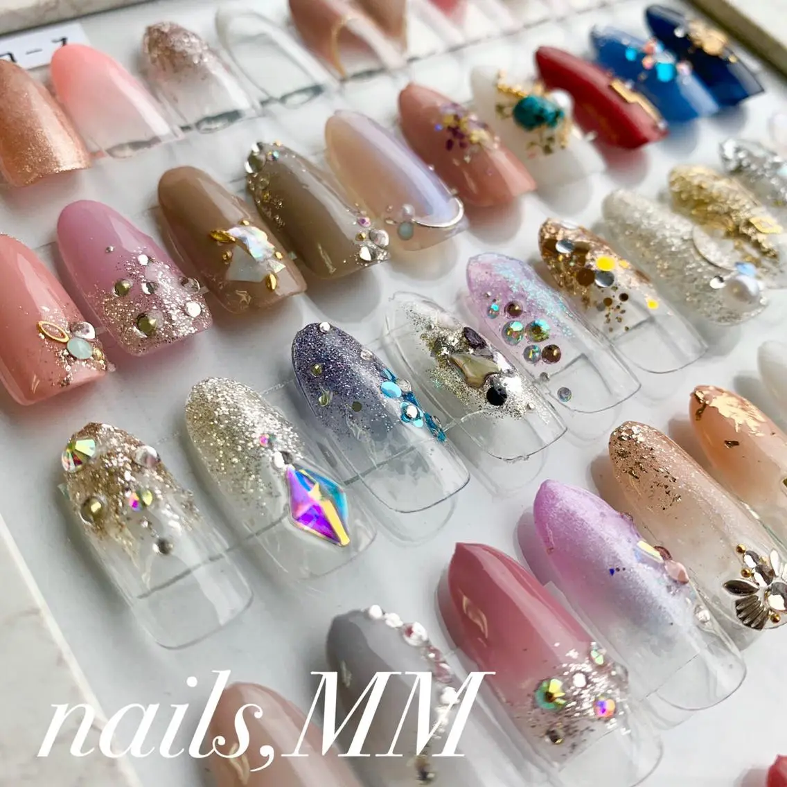 オフィスシンプル（オフ込）（20種類のサンプルから2本選択）※他のお爪はラメグラ、ワンカラー、グラデーションから選択可。の写真