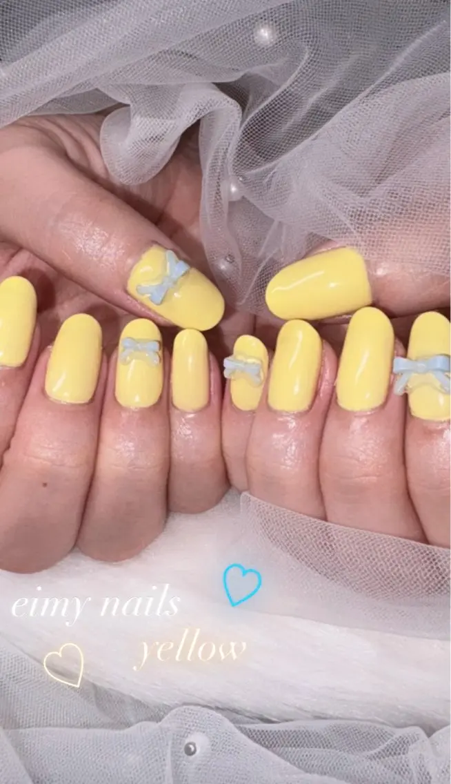 ネイル 水色 ワンカラーネイル リボン 夏ネイル 黄色 ハンドネイル eimy nails♡のネイルデザイン