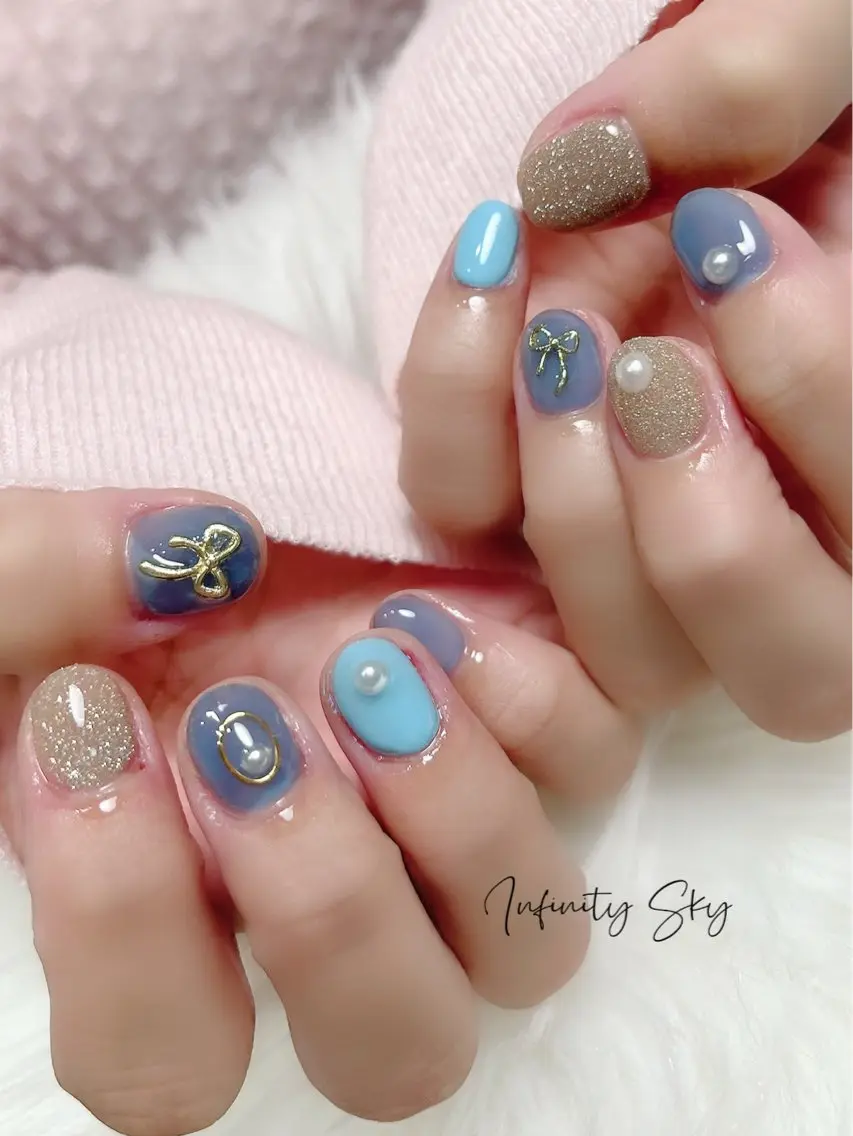 ネイル ブルー リボン 夏ネイル infinity skyのネイルデザイン