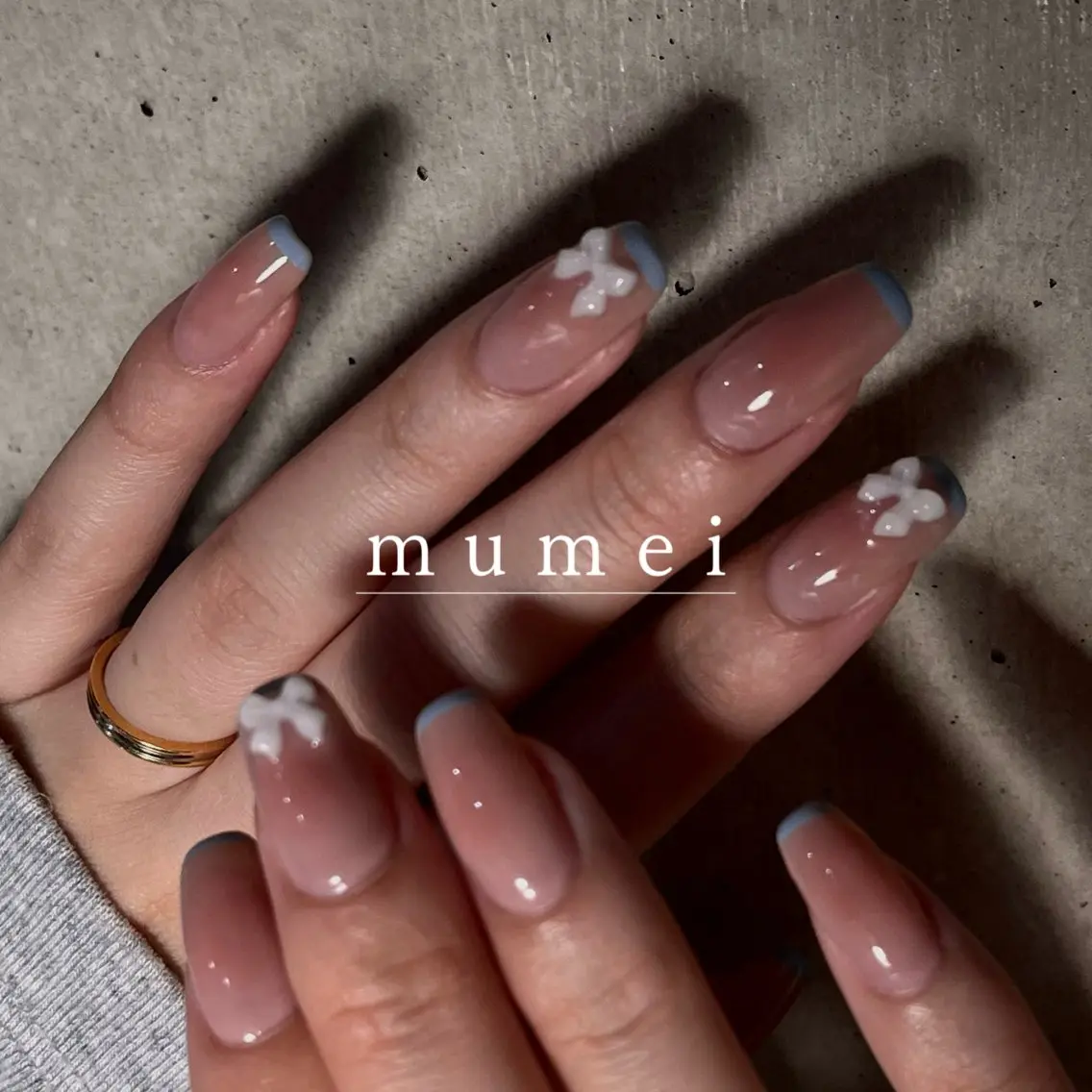ネイル チークネイル フレンチネイル リボン ハンドネイル mumei _ NATSUYOのネイルデザイン