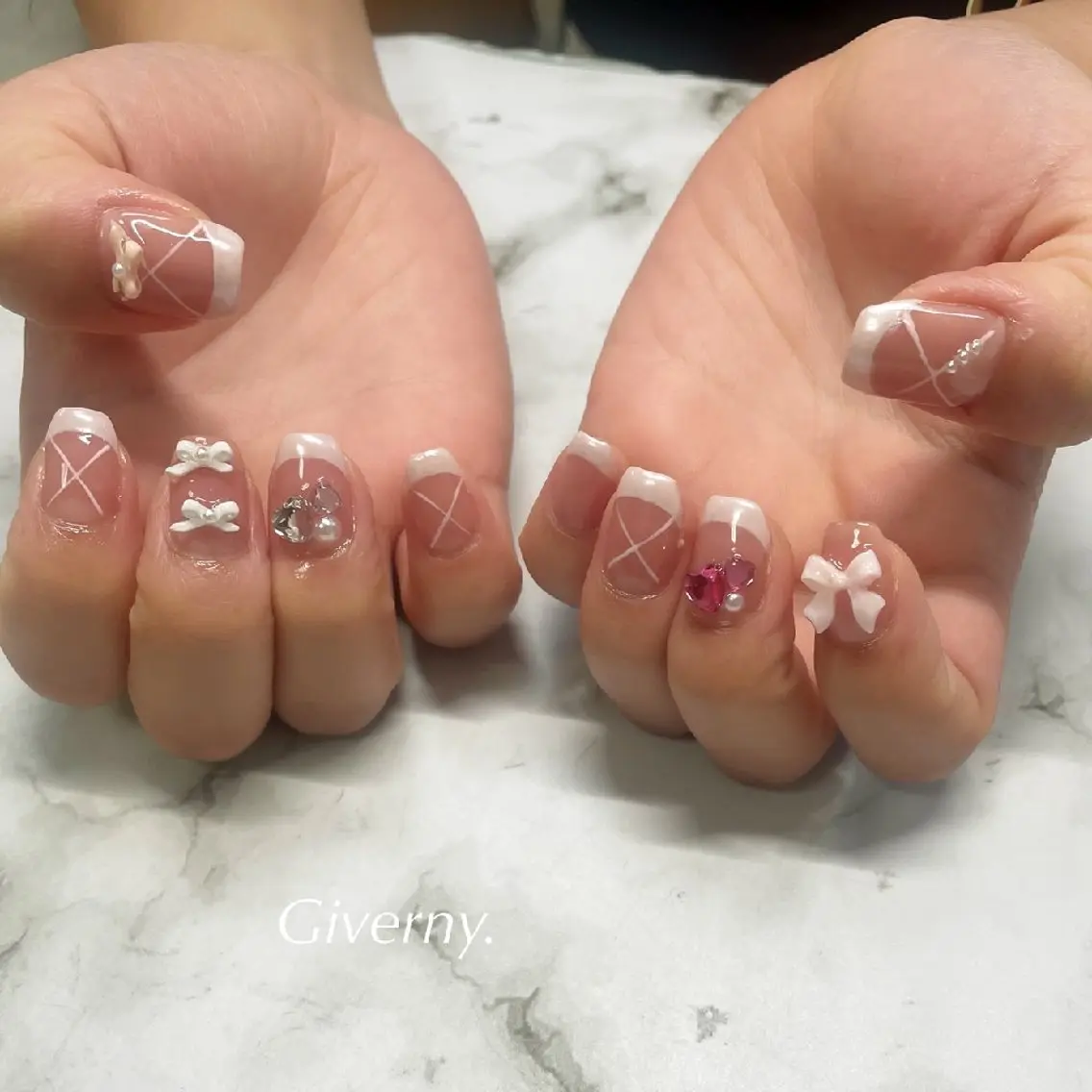 ネイル フレンチネイル ハート ミラーネイル ピンク リボン ハンドネイル Giverny .のネイルデザイン