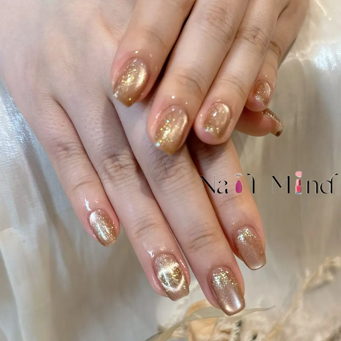 ネイル ジェルネイル ゴールド ハート キラキラネイル ラメ(グリッター) ハンドネイル Nail Mind (NaONail)のネイルデザイン