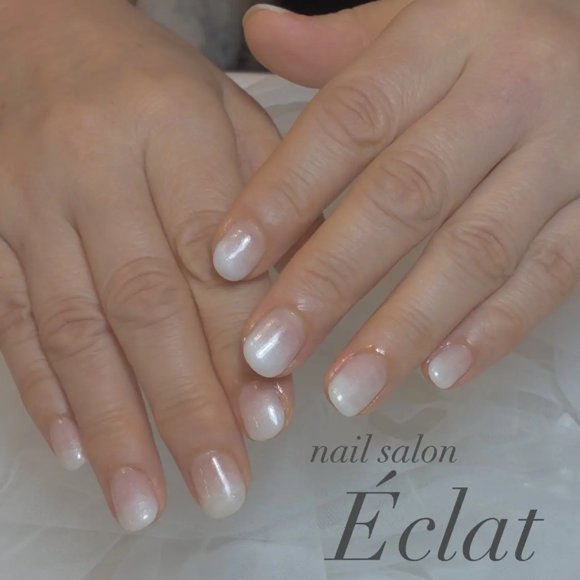 ネイル グラデーション ホワイト ハンドネイル nail salon Éclatのネイルデザイン