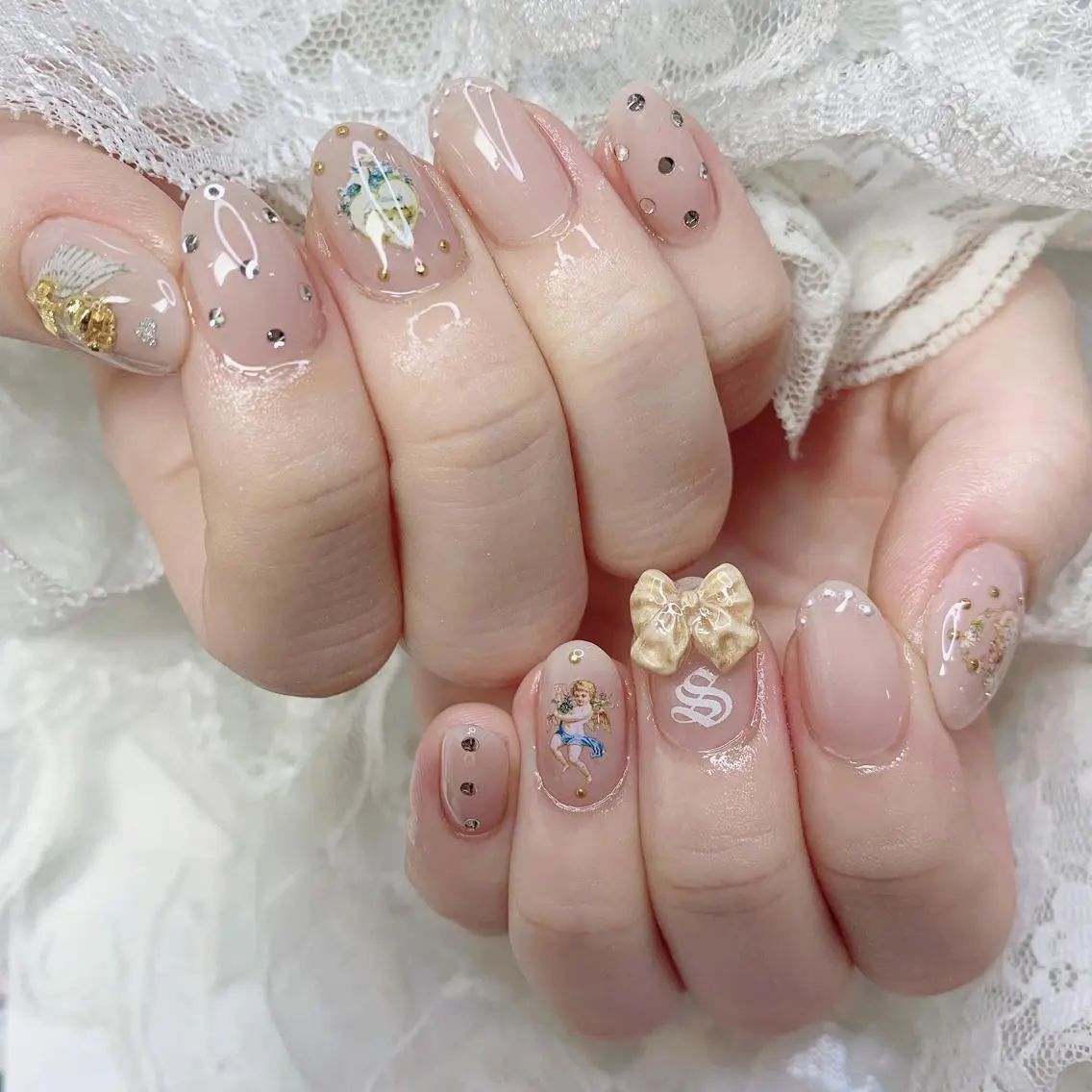 ネイル リボン ハンドネイル La neige* yuki 🐩🌙のネイルデザイン
