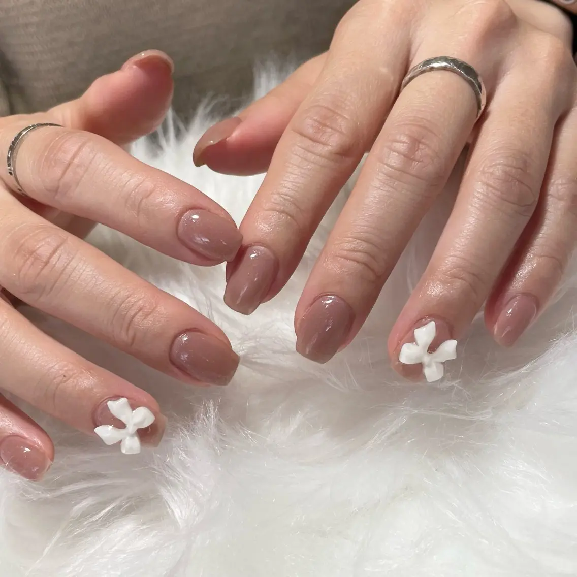 ネイル リボン neige Kouzukiのネイルデザイン