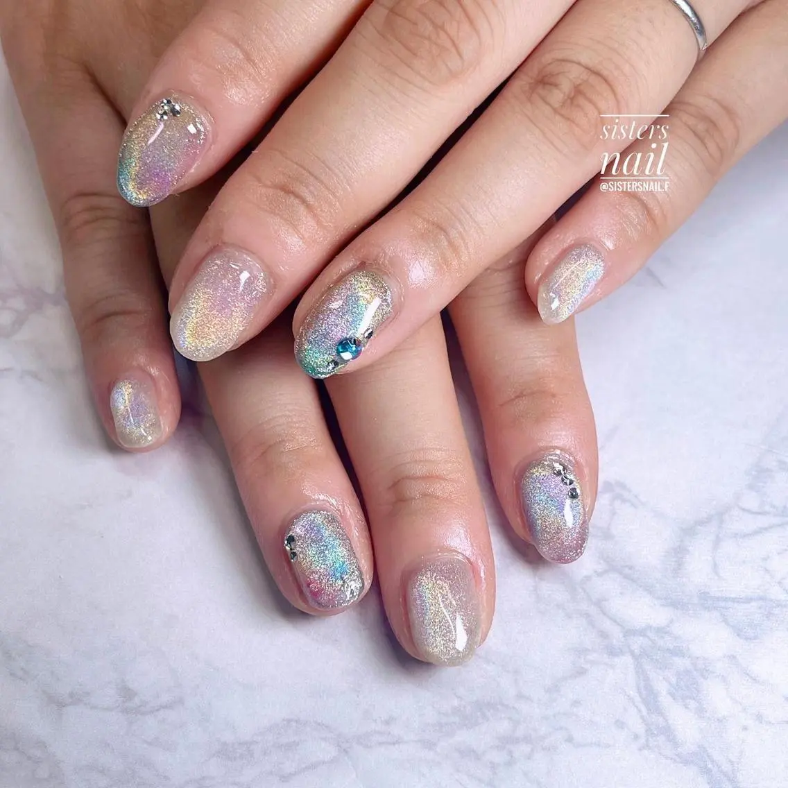 ネイル アートネイル オーロラネイル ブルー クリアネイル ジェルネイル sisters nail.fのネイルデザイン