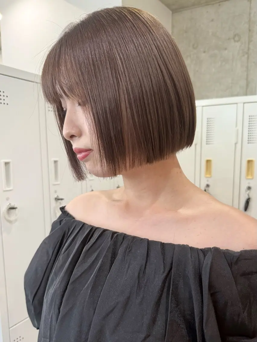 ショート 切りっぱなしボブ ボブレイヤー ボブ くびれヘア 顔まわりレイヤー カット ヘアカラー トリートメント SAKURA omotesandoのヘアスタイル