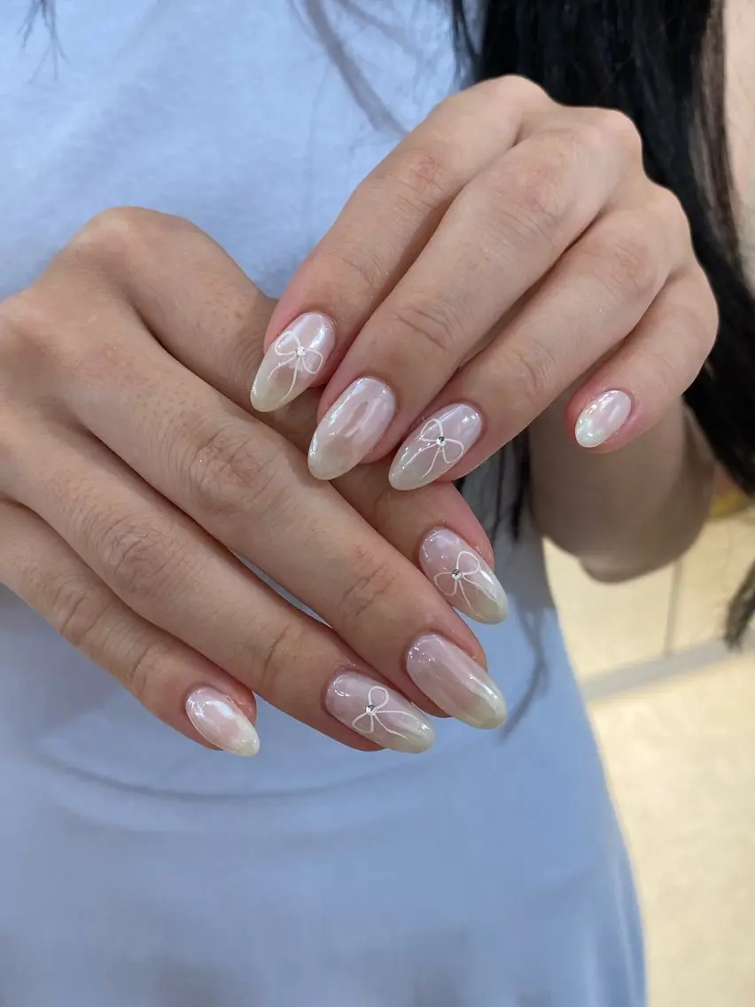 ネイル リボン CLALA Yuri🩶のネイルデザイン