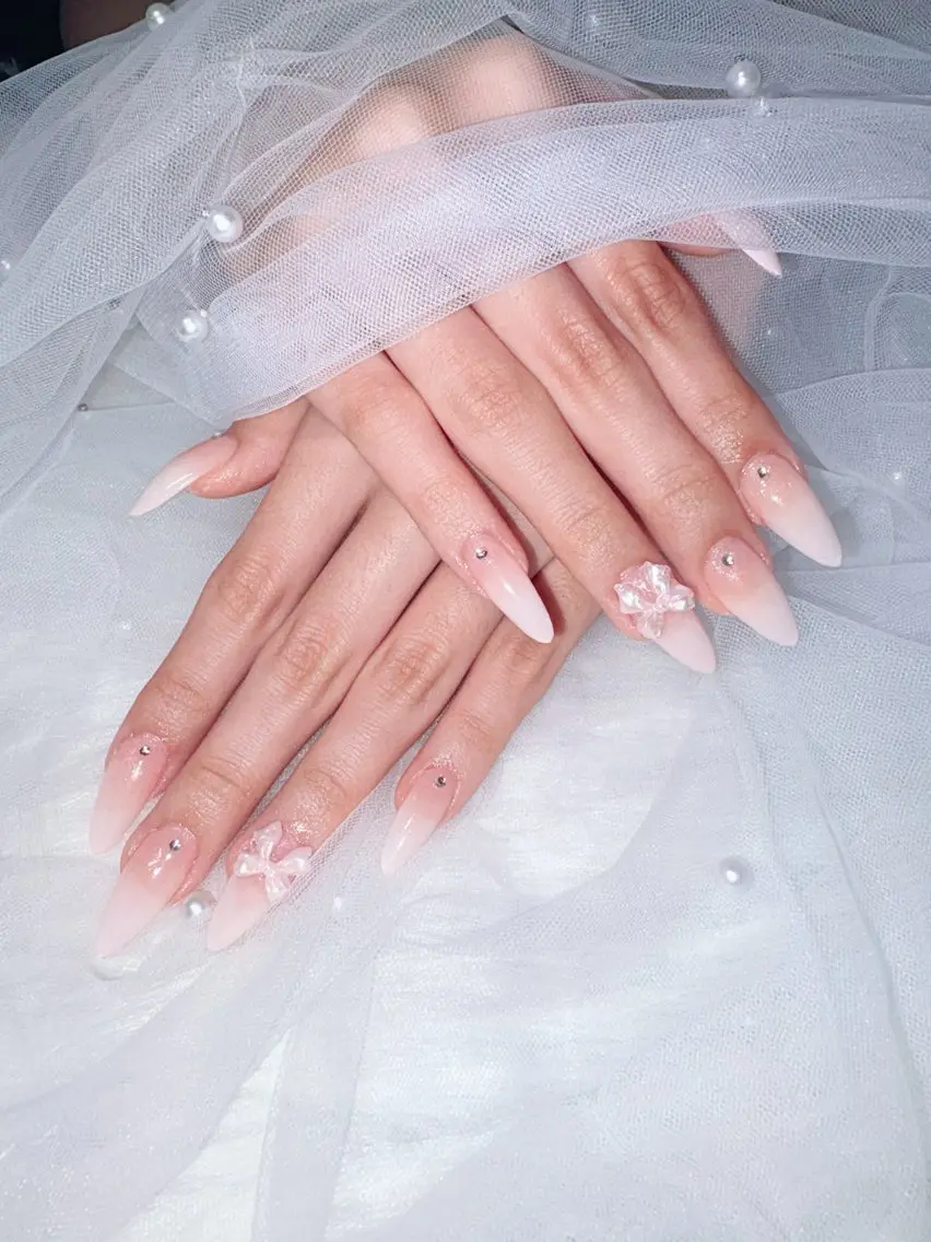 ネイル グラデーション ロングネイル パステルネイル リボン 春ネイル ハンドネイル eimy nails♡のネイルデザイン