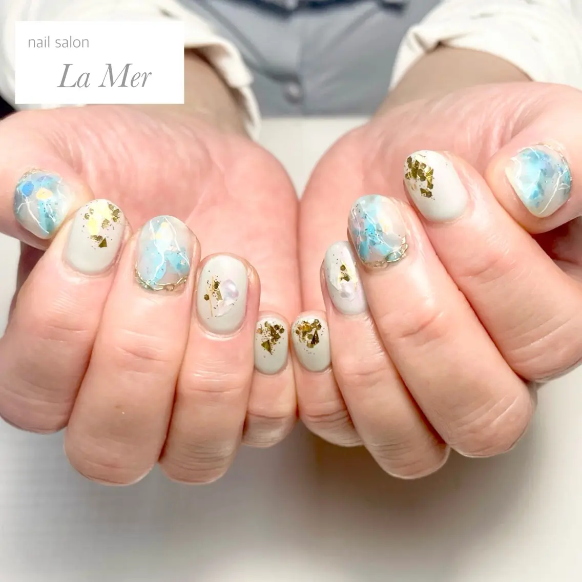 ネイル オーロラネイル ブルー クリアネイル グリーン 水色 ハンドネイル nailsalon La Merのネイルデザイン